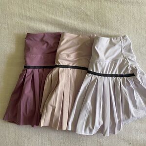 High Waisted Athletic Pleated Skort Trio in Purple, Pink, and White